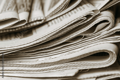 News concept, folded newspaper closeup. photo