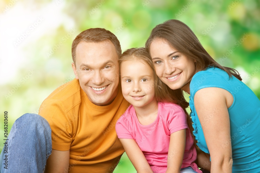 Happy cheerful family on background Happy cheerful family on background