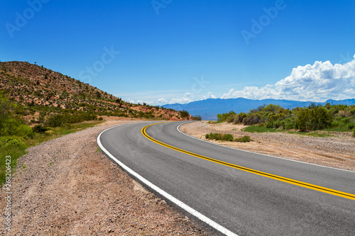 Curved road in the desert in Southern Nevada photo