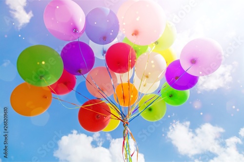 Fototapeta Bunch of colorful balloons on sky background