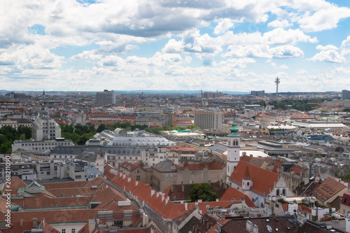 Wien  Austria. May  2019. Panorama of the city from the observation tower of St. Stephen   s Cathedral. Roofs of houses. In the distance  the Alpine Mountains. Sky view.