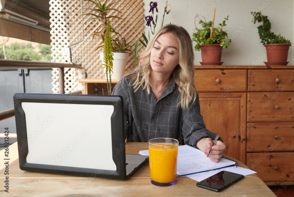 Stylish woman working on laptop Stylish woman working on laptop