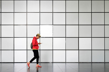 Side view of man using mobile phone