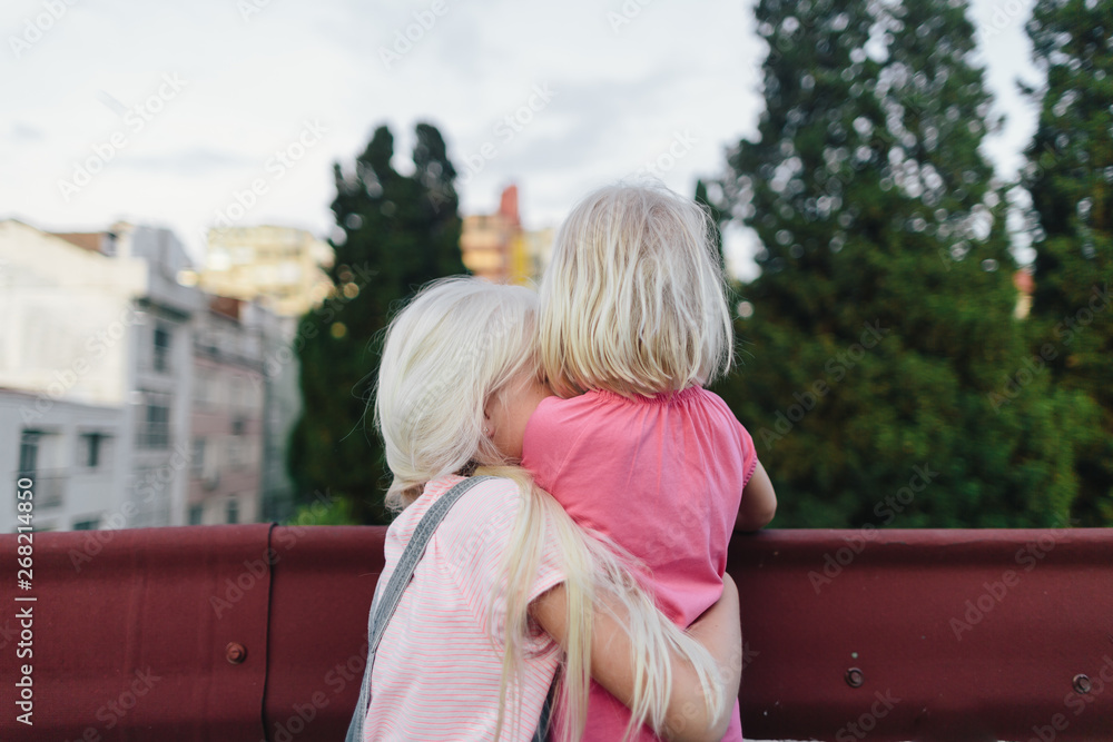 Two kids on the roof