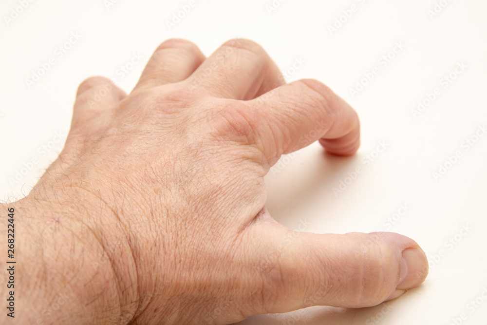 hand eines mannes die sich in den Tisch krallt hand eines mannes die sich in den Tisch krallt