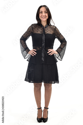 full portrait of a middle age woman with dress and heeled shoes isolated on white