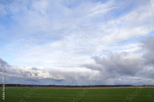 View through the moving car windscreen.