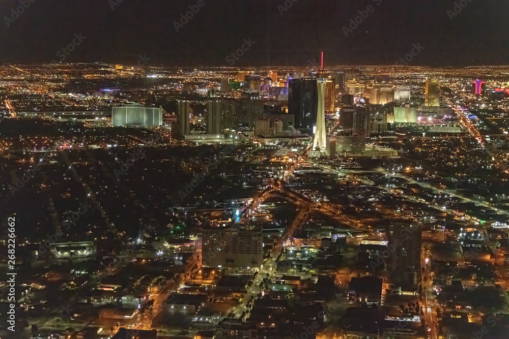 Night aerial view of Las Vegas skyline from helicopter