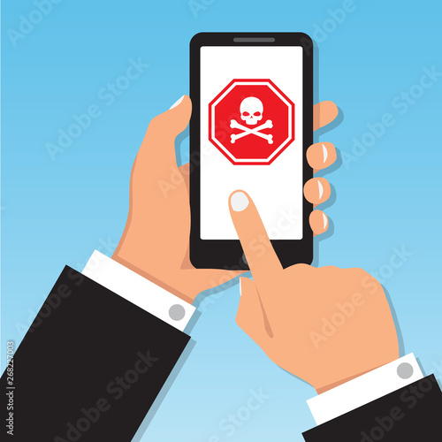 Skull and bones red logo warning attention icon smartphone screen. Hand holding phone with virus warning icon. Finger touch screen. Cartoon for advertisement, web sites, banners, infographics design.