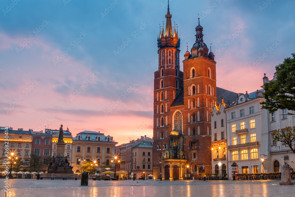Fototapeta premium view of the main square of krakow and mariac church at spring