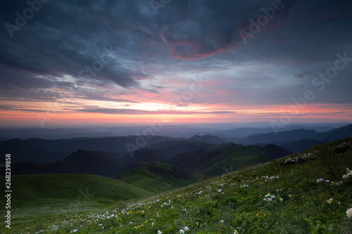 Russia. The formation and movement of clouds over the summer slopes of Adygea Bolshoy Thach and the Caucasus Mountains