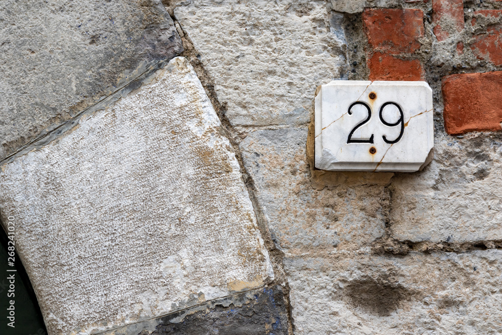 numero 29 marmo, numero civico antico,primo piano Stock Photo | Adobe Stock