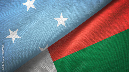 Micronesia and Madagascar two flags textile cloth, fabric texture