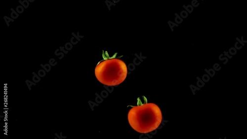 tomatoes coming down by turning the water in the dark