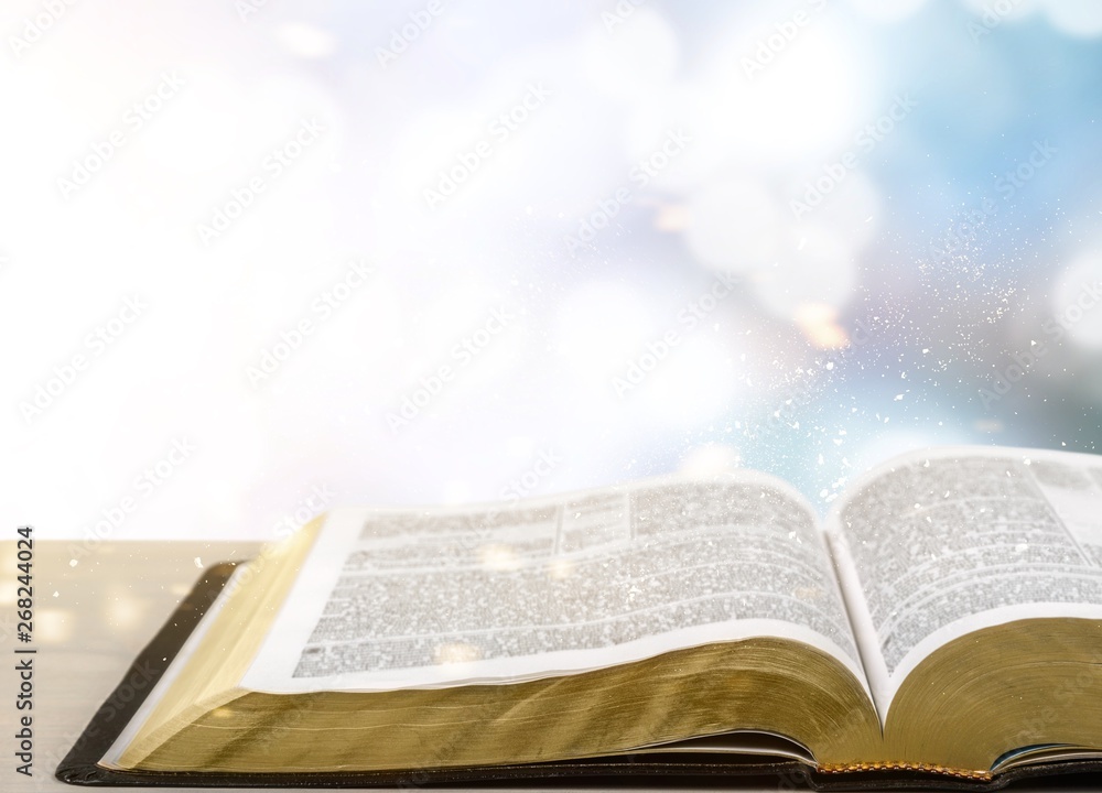 Fototapeta premium Holy Bible book on a wooden background