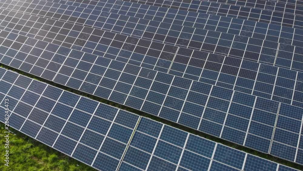 renewable energy: modern solar panels and wind turbines (aerial view) renewable energy: modern solar panels and wind turbines (aerial view)