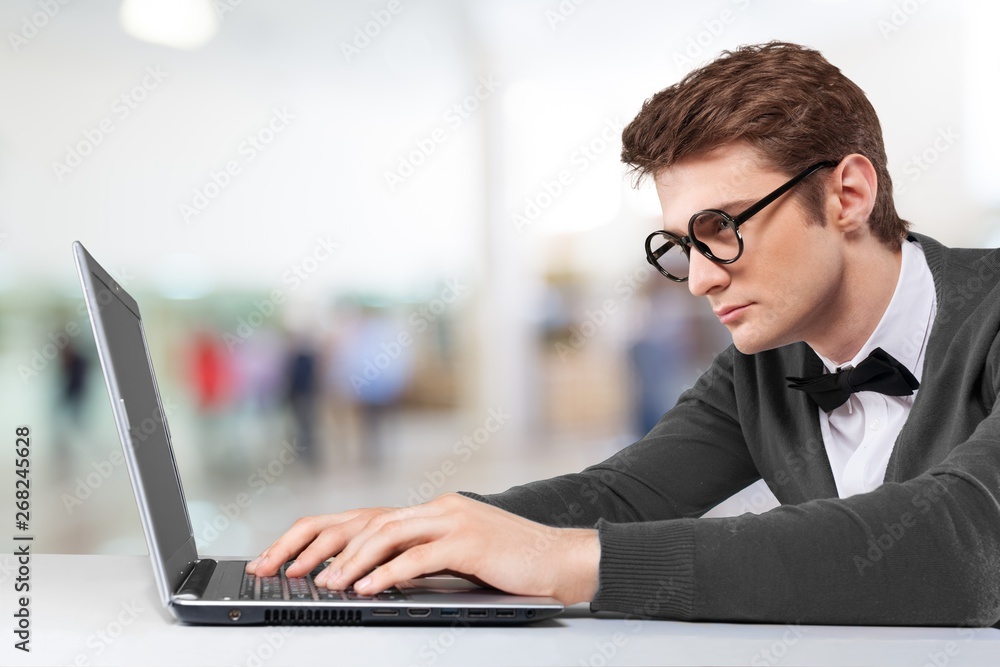 Smiling African Student man with laptop, mall background, bokeh Smiling African Student man with laptop, mall background, bokeh