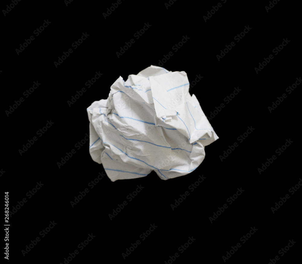 crumpled paper ball on black background