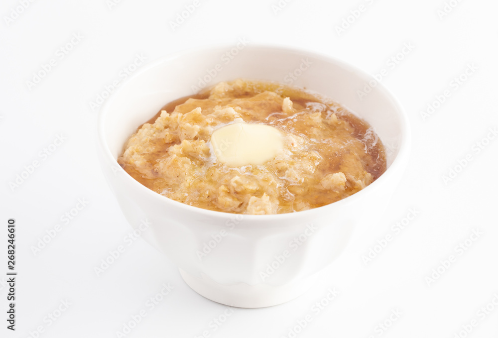 Oatmeal with Butter and Honey on a White Background Oatmeal with Butter and Honey on a White Background