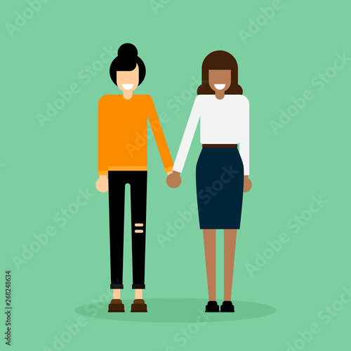 LGBT community concept, young women couple holding hands together