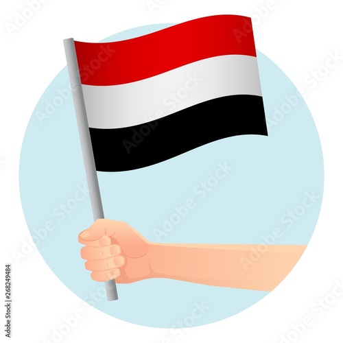 yemen flag in hand
