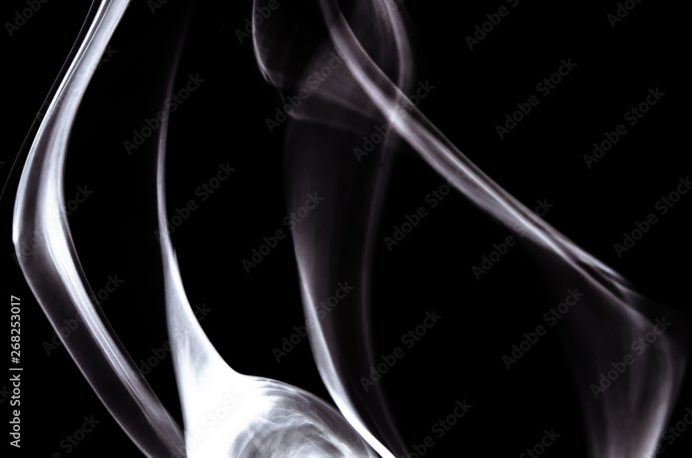 Naklejka premium Nature Abstract: The Delicate Beauty and Elegance of a Wisp of White Smoke