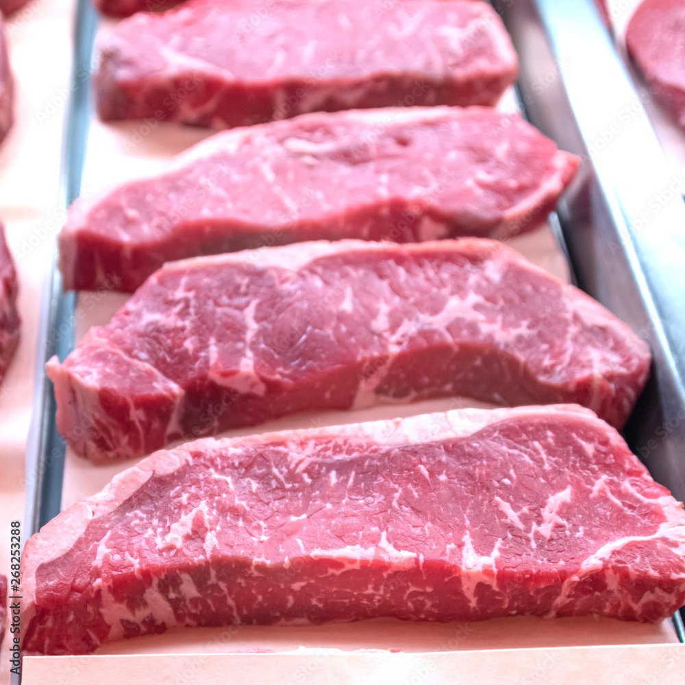 Sirloin beef steak for sale at a butchers shop Sirloin beef steak for sale at a butchers shop