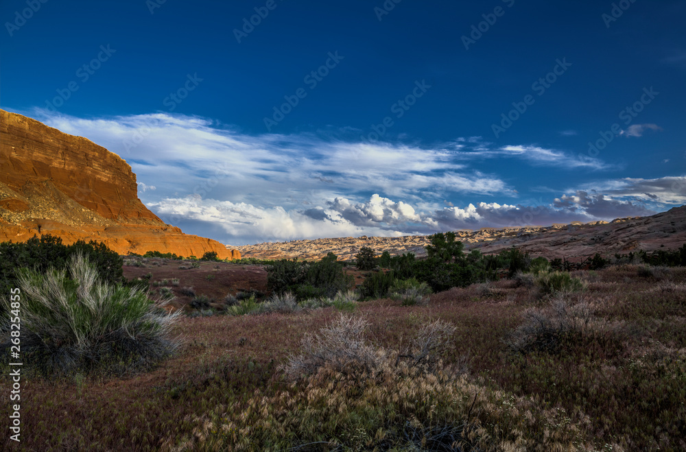 A late in the day shot of clouds gathering over the Waterpocket Fold in Capitol Reef National Park.