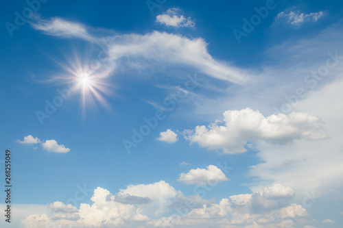 Beautiful blue sky and white clouds in sunny day.  Soft focus 
