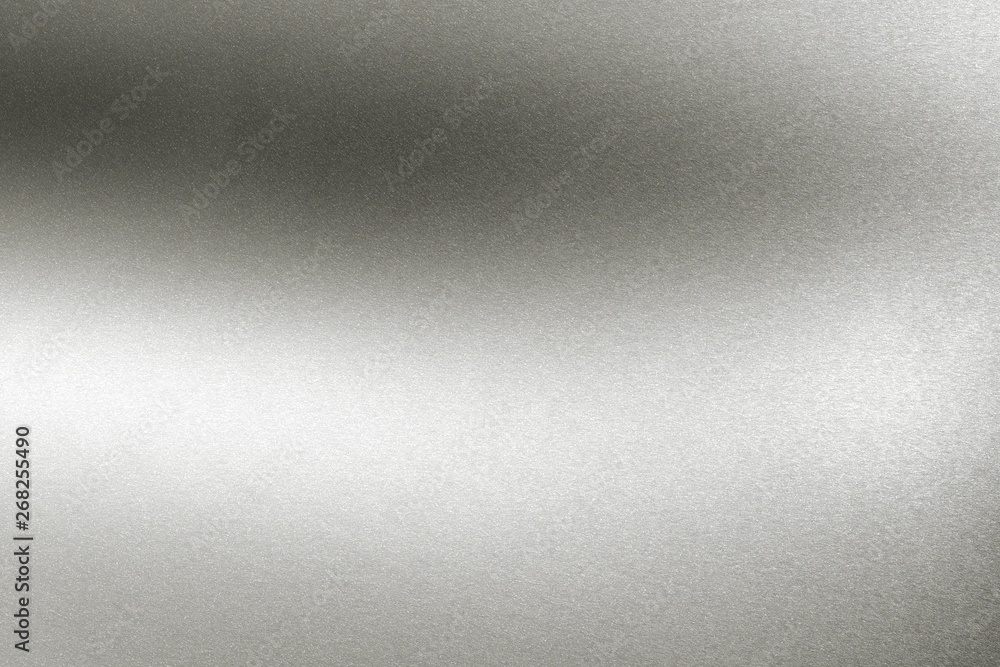 Brushed glossy silver metallic texture, abstract background Brushed glossy silver metallic texture, abstract background