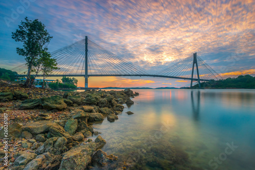 the beauty of the bridge in the morning with an exclusive blend of sky