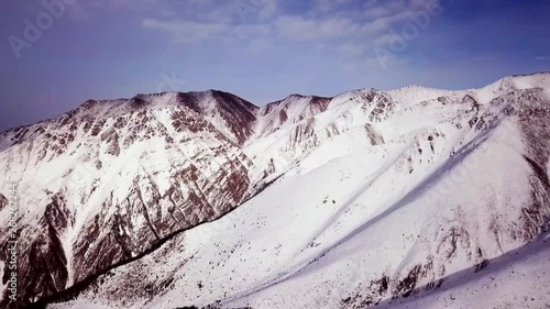 Snow Valley in Northen Tien-Shan Mountain Range in Kyrgyzstan. Ala-Too range near Kegety River running through a great day hike past Tokmok from Bishek. Road Trip in Central Asia and Kegety Gorge photo