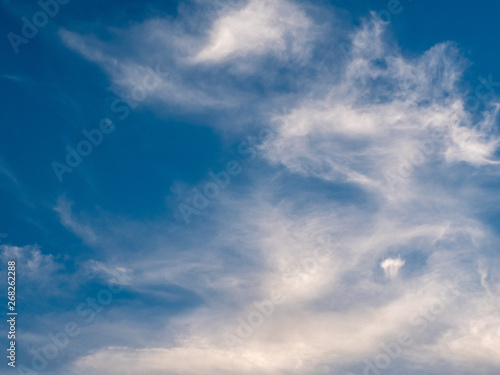 Blue sky background with white clouds