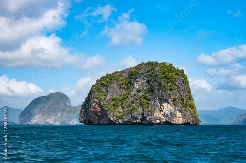 Small limestone round rock island in the region of El nido of the Palawan archipelago in the Philippines.