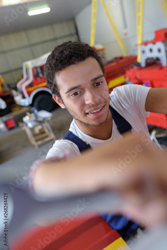 government owned vehicle maintenance worker © auremar