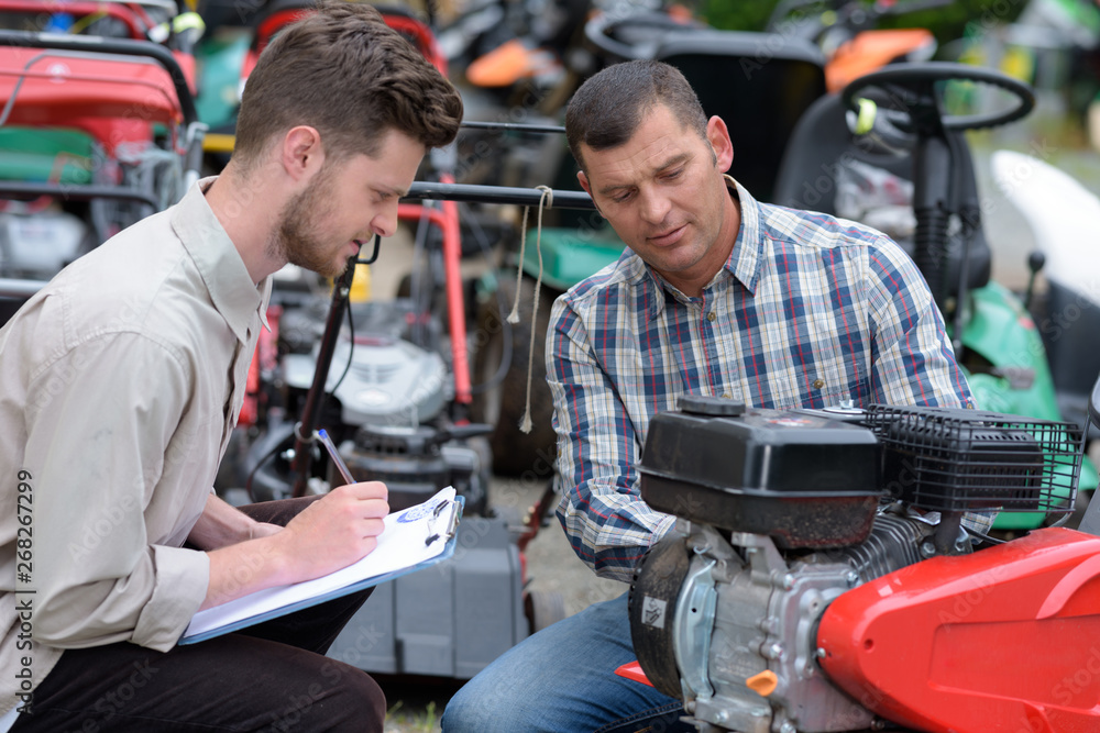 men repair brush cutter engine men repair brush cutter engine