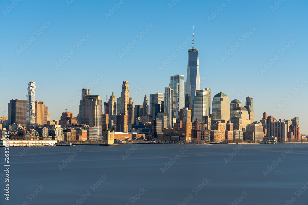 Fototapeta premium Scene of New york cityscape river side which location is lower manhattan which can see One world trade conter, USA, Taking from New Jersey