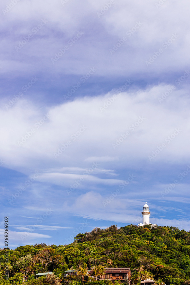 View of Cape Byron Lighthouse, Byron Bay, with lots of sky above.
