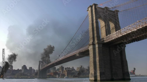 New York City and brooklyn bridge under attack Illustration Powerful Video Compositing simulates Real footage with visual effects elements of New York City manhattan  and brooklyn bridge under attack 
