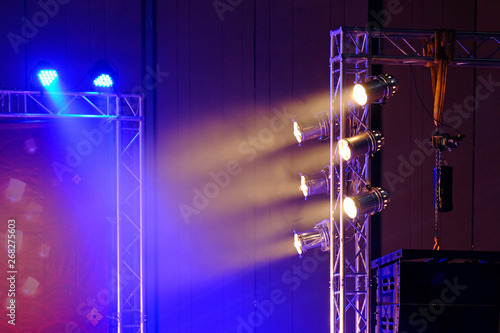 Spotlights hanging with side steel structure, lighting to the stage with smoke effect