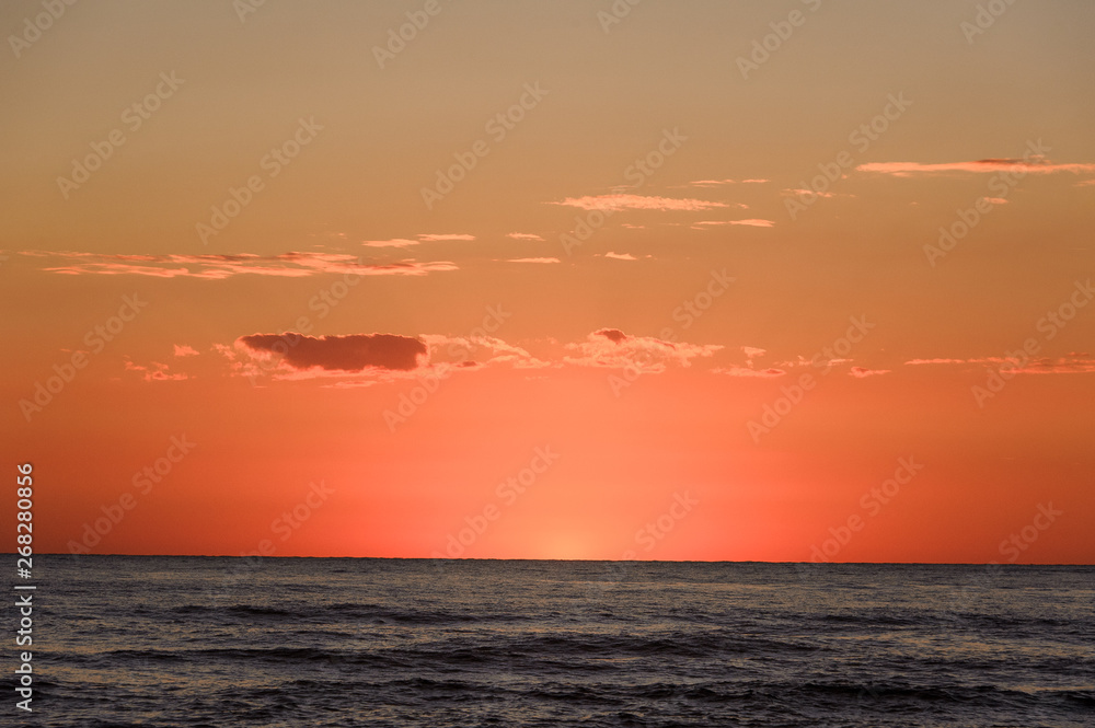 Astonishing sunset in the calm Mediterranian sea