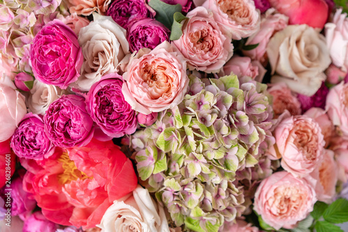 Fototapeta Naklejka Na Ścianę i Meble -  Close-up Large Beautiful bouquet of mixed flowers. Flower background and Wallpaper. Floral shop concept . Beautiful fresh cut bouquet. Flowers delivery