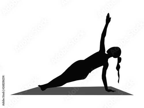 silhouette of woman doing yoga