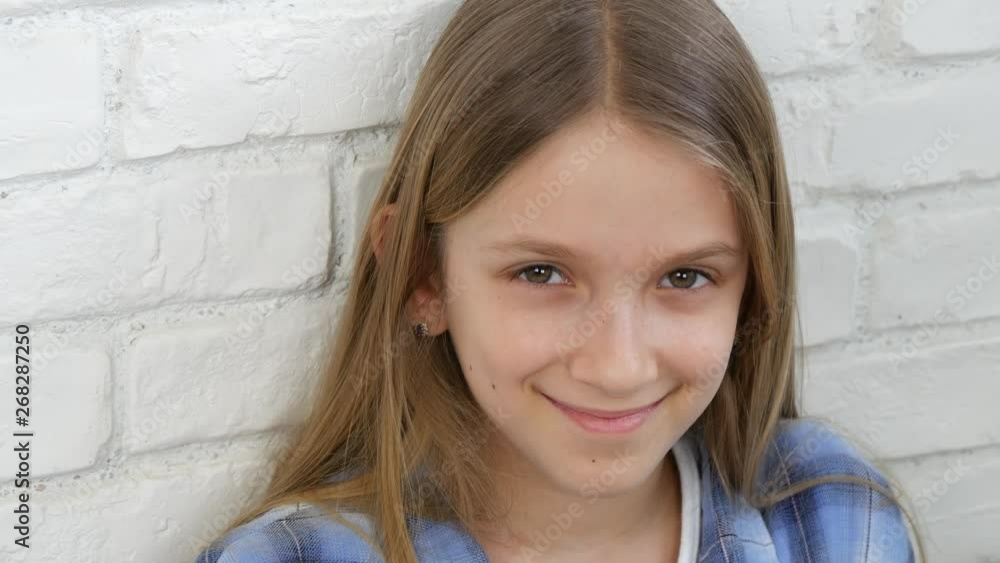 Thoughtful Child Portrait, Smiling Kid Face Looking in Camera Blonde Bored Girl Thoughtful Child Portrait, Smiling Kid Face Looking in Camera Blonde Bored Girl