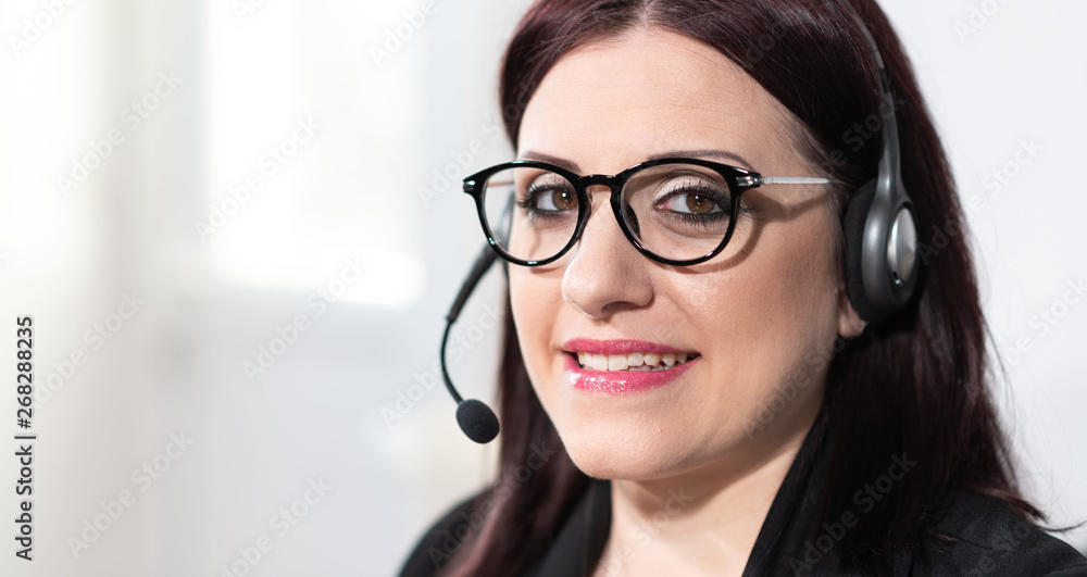 Portrait of female phone operator with headset Portrait of female phone operator with headset