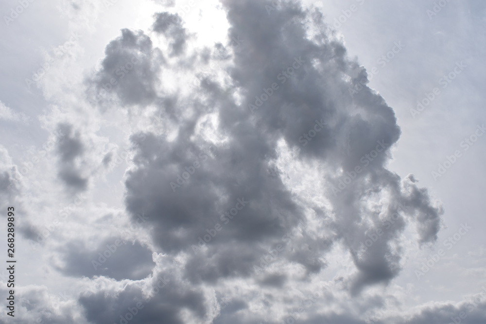 Obraz premium Sky clouds sun storm dark background