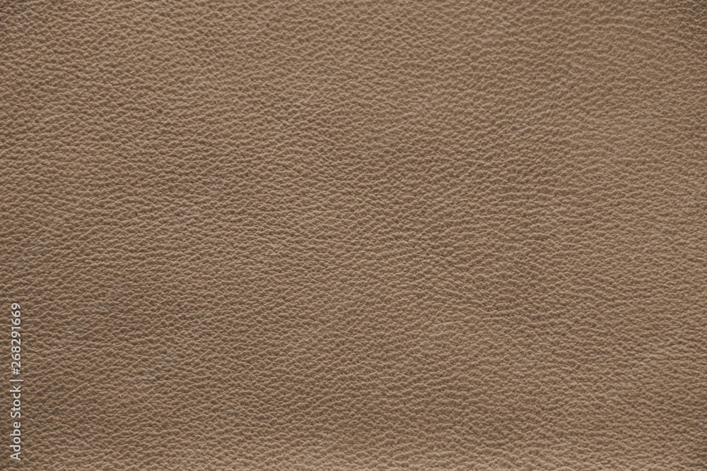 The texture of genuine leather. Impeccable and stylish background. Beautiful stylish background. Natural skin texture close up. Brown background. The structure of the leather material brown shades. The texture of genuine leather. Impeccable and stylish background. Beautiful stylish background. Natural skin texture close up. Brown background. The structure of the leather material brown shades.