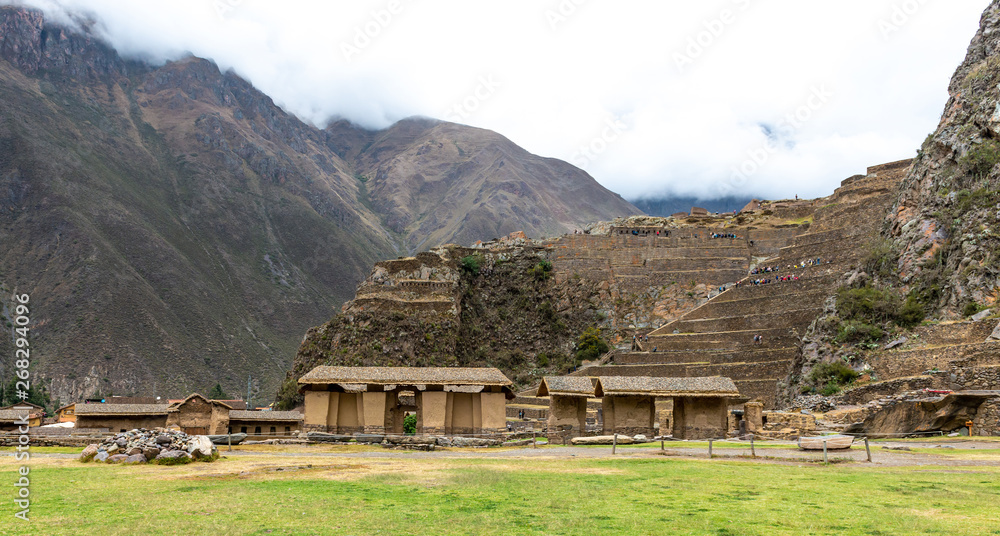Stone huts under the mountain in Ollantaytambo Stone huts under the mountain in Ollantaytambo