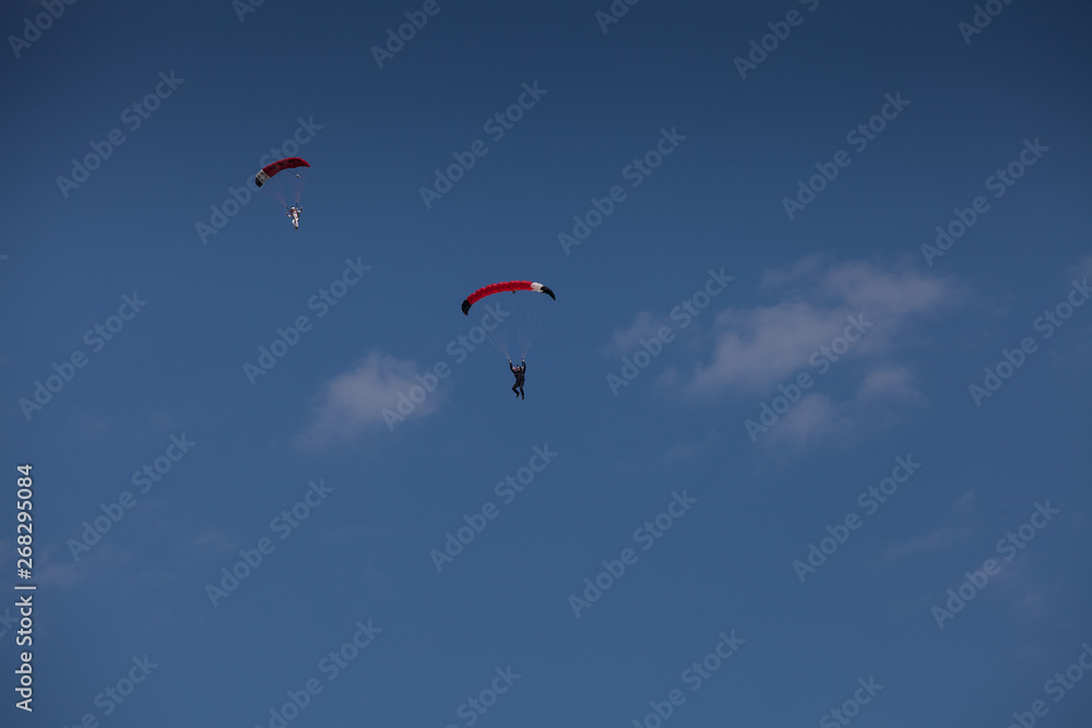 Skydive, people in the sky, under clouds Skydive, people in the sky, under clouds