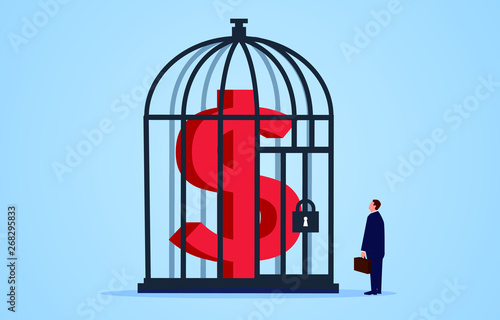 Businessman looking at the dollar inside the cage